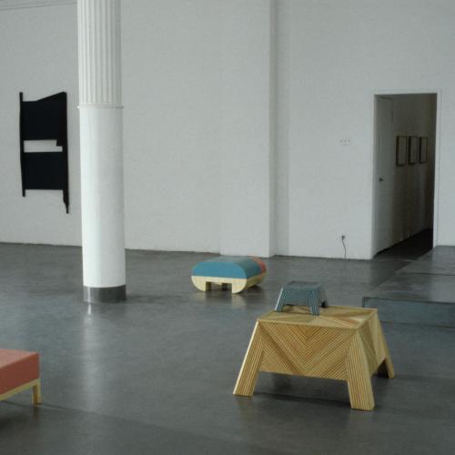Photographic Materials depicts: artworks installed in a gallery