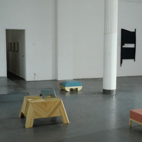 Photographic Materials depicts: artworks installed in a gallery