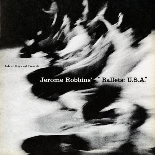Programs depicts: A blurred photograph of a group of people sliding on their knees