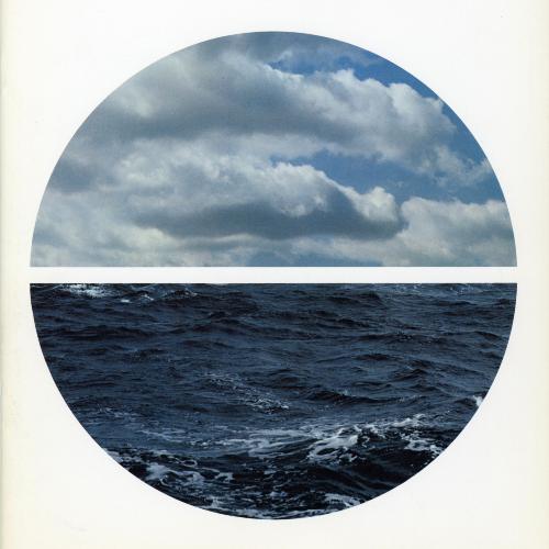 Annual Reports and Corporate Communications depicts: Inside of a circle is a photo of the ocean and sky, there is a white line through the middle of the circle, which splits where the ocean meets the sky 