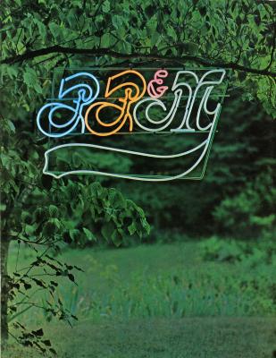 Booklet/Brochure depicts: A multicolor neon sign hangs off of a tree in the woods