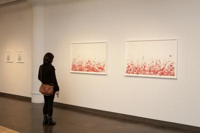 Digital Files, Photographic Materials depicts: people looking at artworks in gallery
