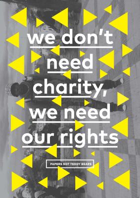 Posters depicts: A man stands in front of a cityscape, the image is sideways, Yellow triangles and text are over the image