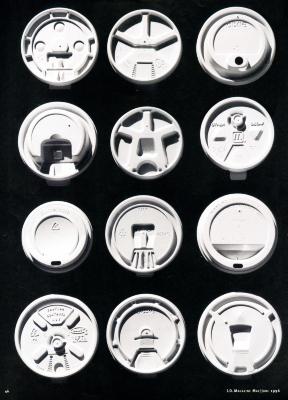 12 different white plastic coffee cup lids arranged in a grid