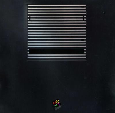 Research materials, Booklet/Brochure depicts: Black computer hard drive with square NEXT logo in colorful letters