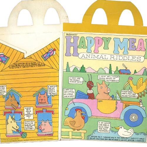 Packaging depicts: Cartoon animals driving a car and leaning out a barn window, telling jokes.