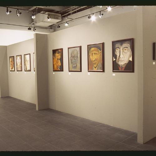 Photographic Materials depicts: installation of artworks in gallery