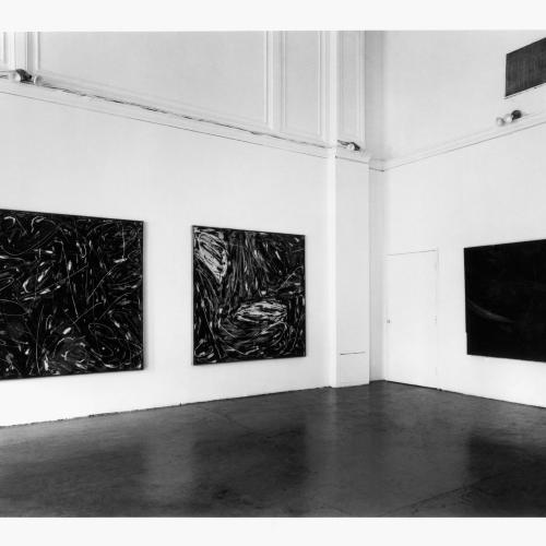 Photographic Materials depicts: black-and-white installation of artworks in a gallery