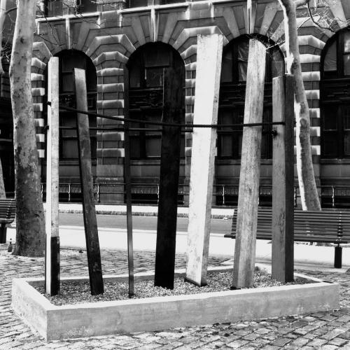Photographic Materials depicts: black and white photographic print of artworks outside a gallery